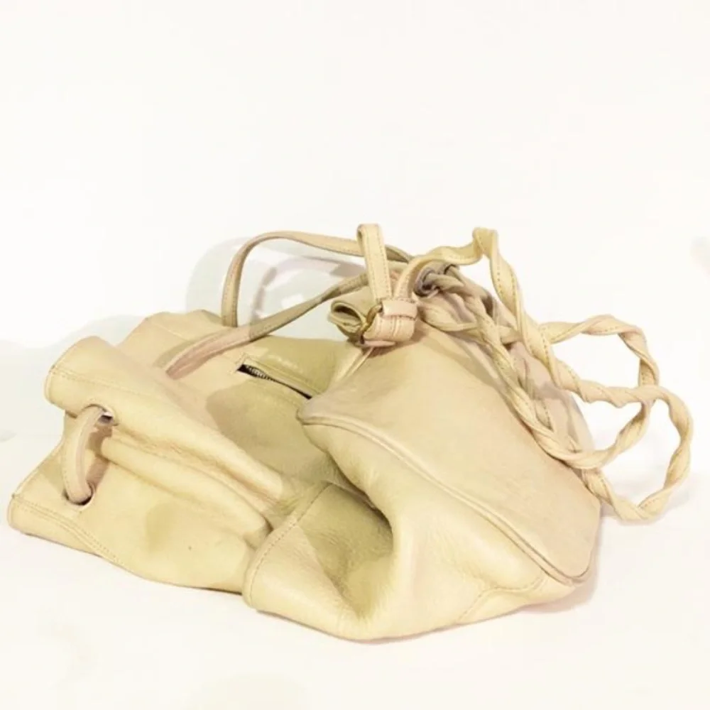 Genuine leather cream color handmade backpack sling bag drawstring vintage